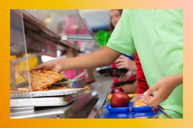 kid getting school lunch 