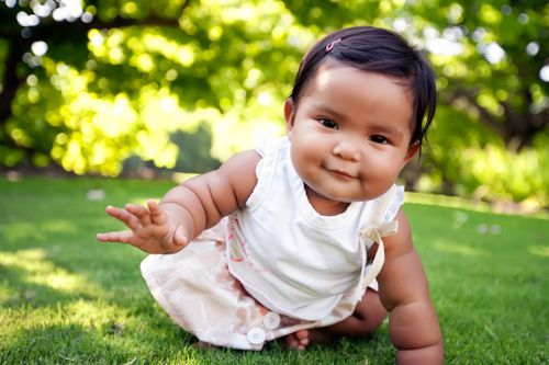 Baby girl in the grass