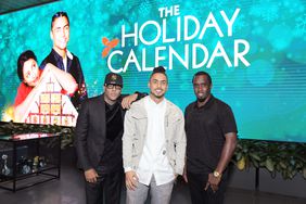 Al B. Sure!, Quincy Brown and Sean "Diddy" Combs pose at a movie screening. 