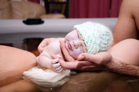 Brand new baby born via natural home water birth