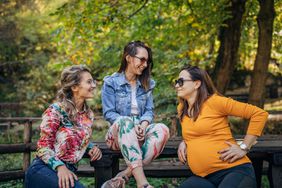 An image of three women talking.