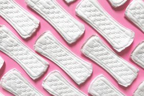 High Angle View Of Sanitary Pads Over Pink Background