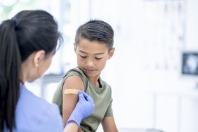 Kid getting a vaccine