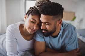 couple sharing a sensitive moment at home