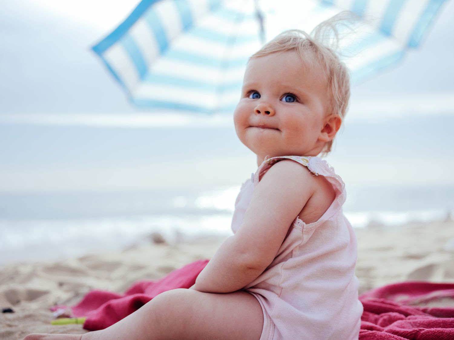 Girl sitting on the beach