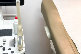 generic medical examination chair & ultrasound machine