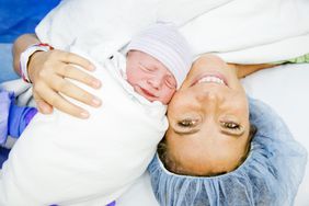 Cesarean Section C-Section Birth Mother and Newborn