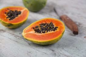 two pieces of cut papaya