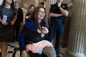 Senator Tammy Duckworth with newborn daughter 