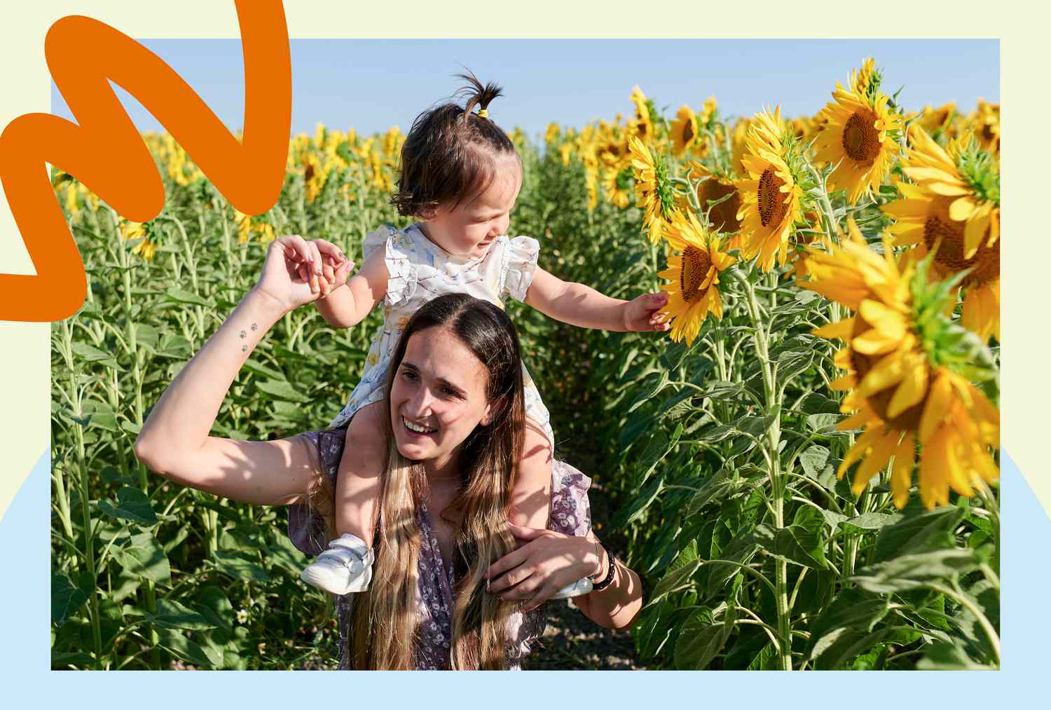 parent with baby on shoulders