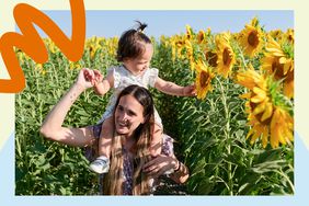 parent with baby on shoulders