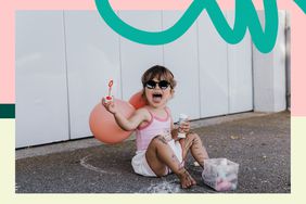 girl blowing bubbles wearing sunglasses