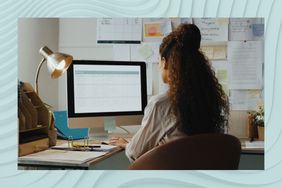 Woman working at a desk 