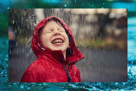 Boy playing in the rain 