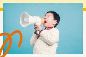 Child yelling into a megaphone 