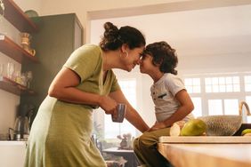 mom with her son in the kitchen