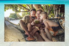 Family drinks out of a coconut while sitting on a hammock