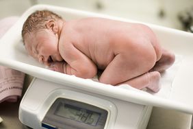 Big baby weighed on scale at hospital