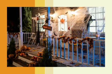 A porch with Halloween decor 