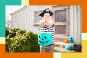 Boy holding a teal Halloween bucket 