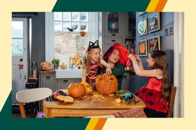 A mom and two daughters make jack-o-lanterns together at their kitchen table. 