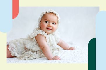 Baby in a vintage outfit and bonnet