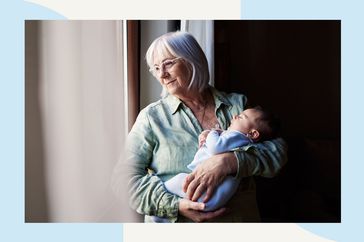 Grandparent holding newborn grandchild