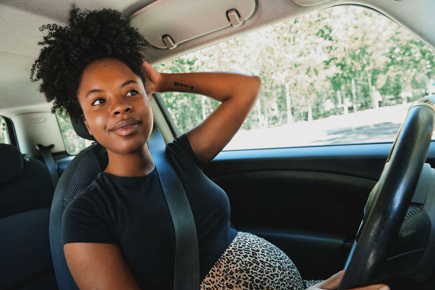 Pregnant Woman Driving Car 