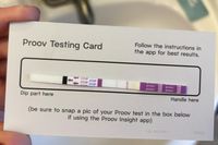 Proov Predict & Confirm Kit strip attached to the testing card