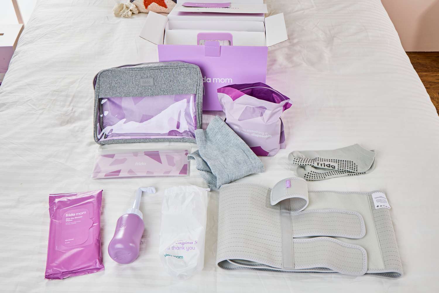 The different items in the Frida Mom C-Section Recovery Kit