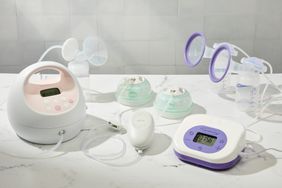 Assortment of breast pumps on marble countertop