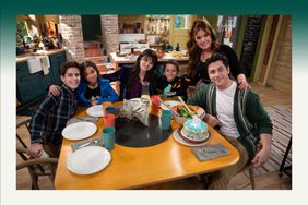 Cast of Disney's 'Wizards Beyond Waverly Place' sitting around a table.